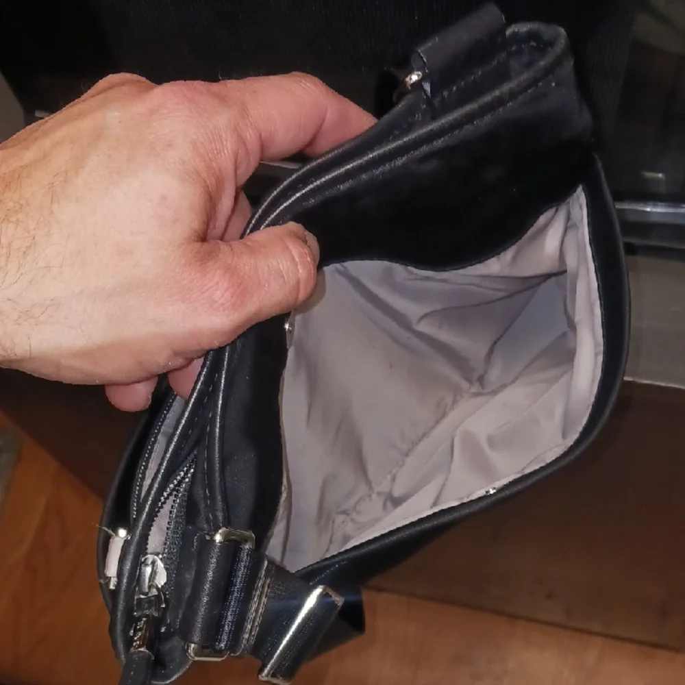 Tumi Black Messenger Bag with Adjustable Strap